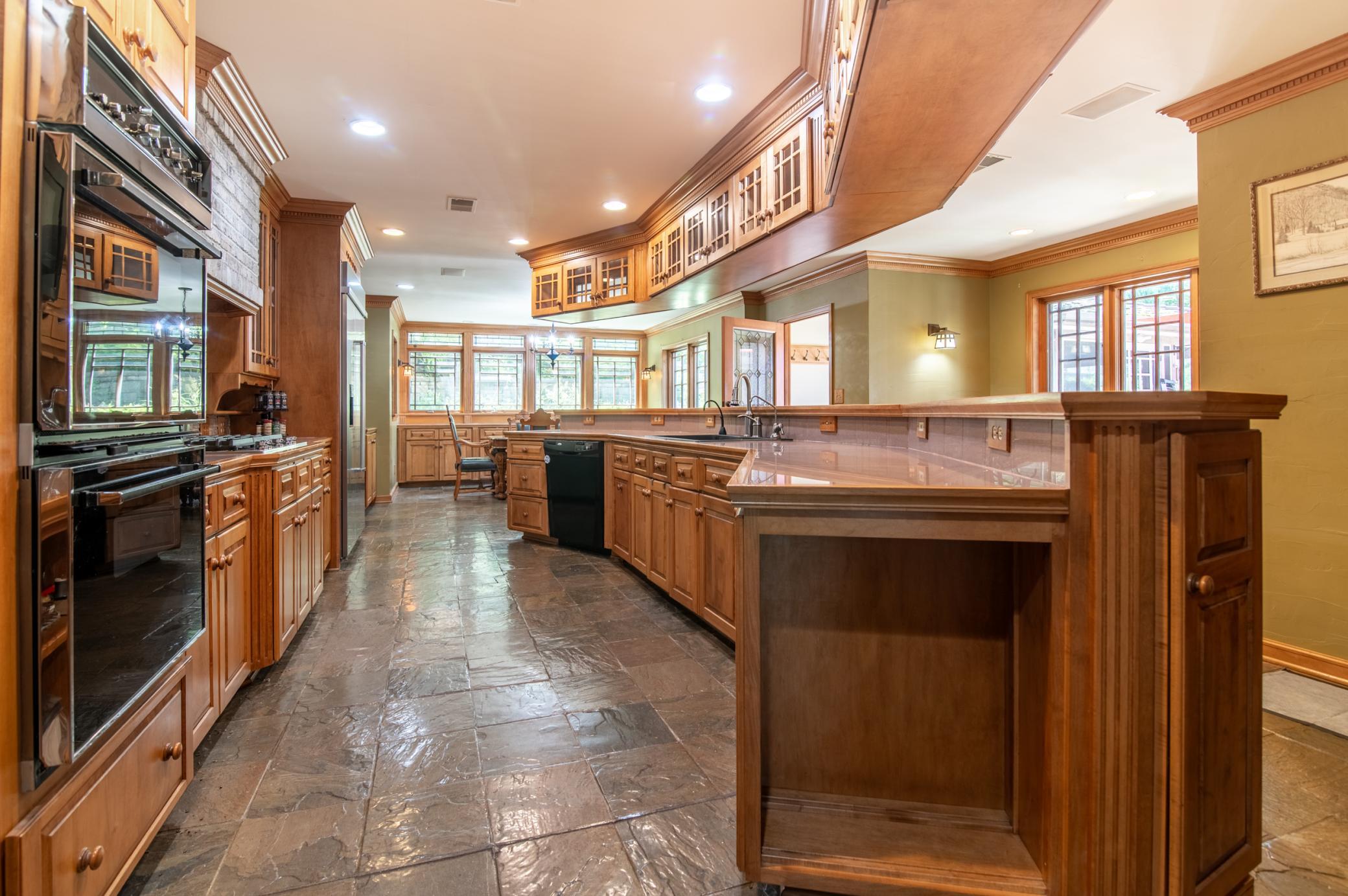 With it's slate tile floors and loads of storage, this kitchen is gourmet heaven.