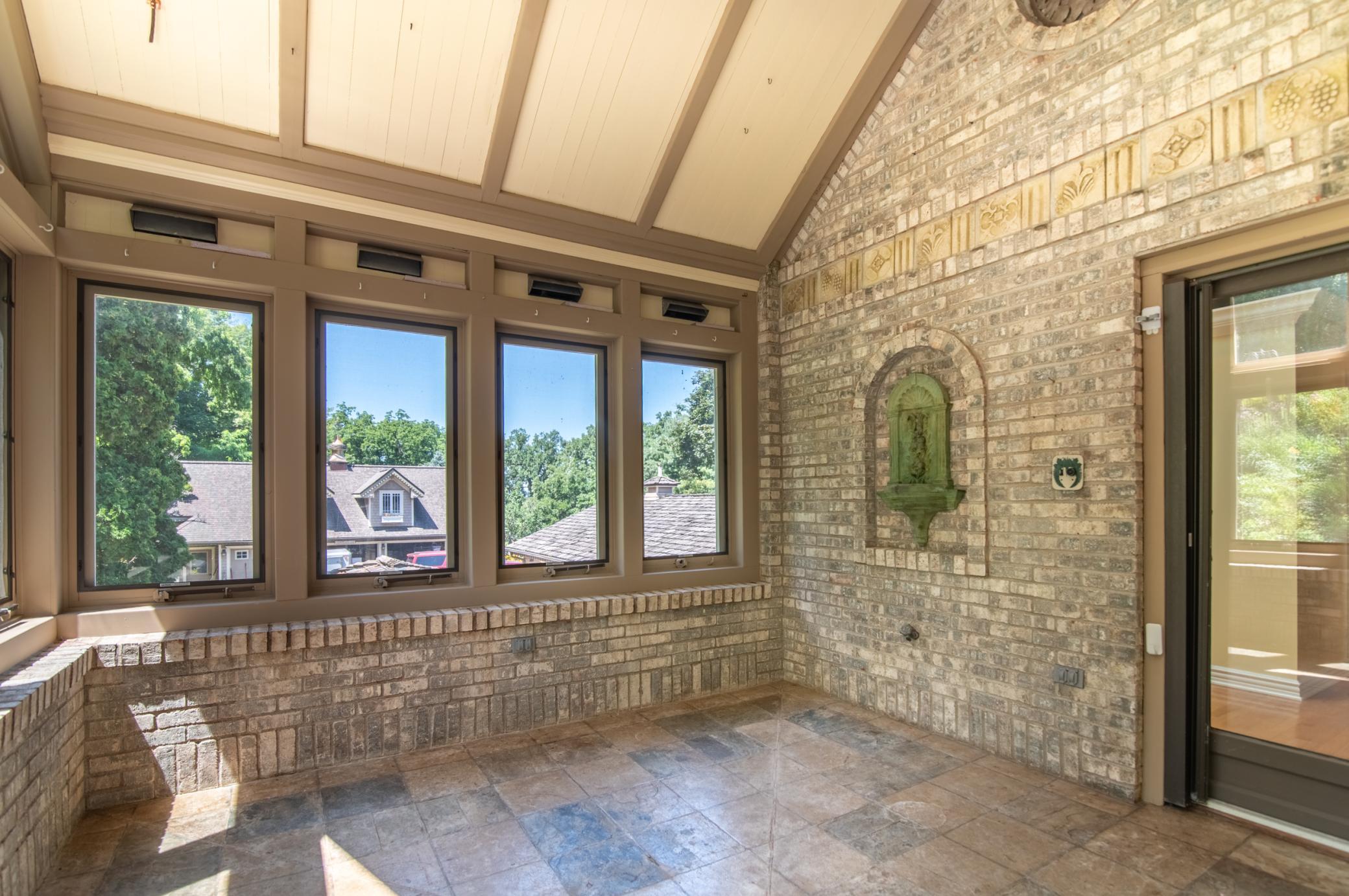 Complete with hose bibb, this space truly was imagined for plants and people.
