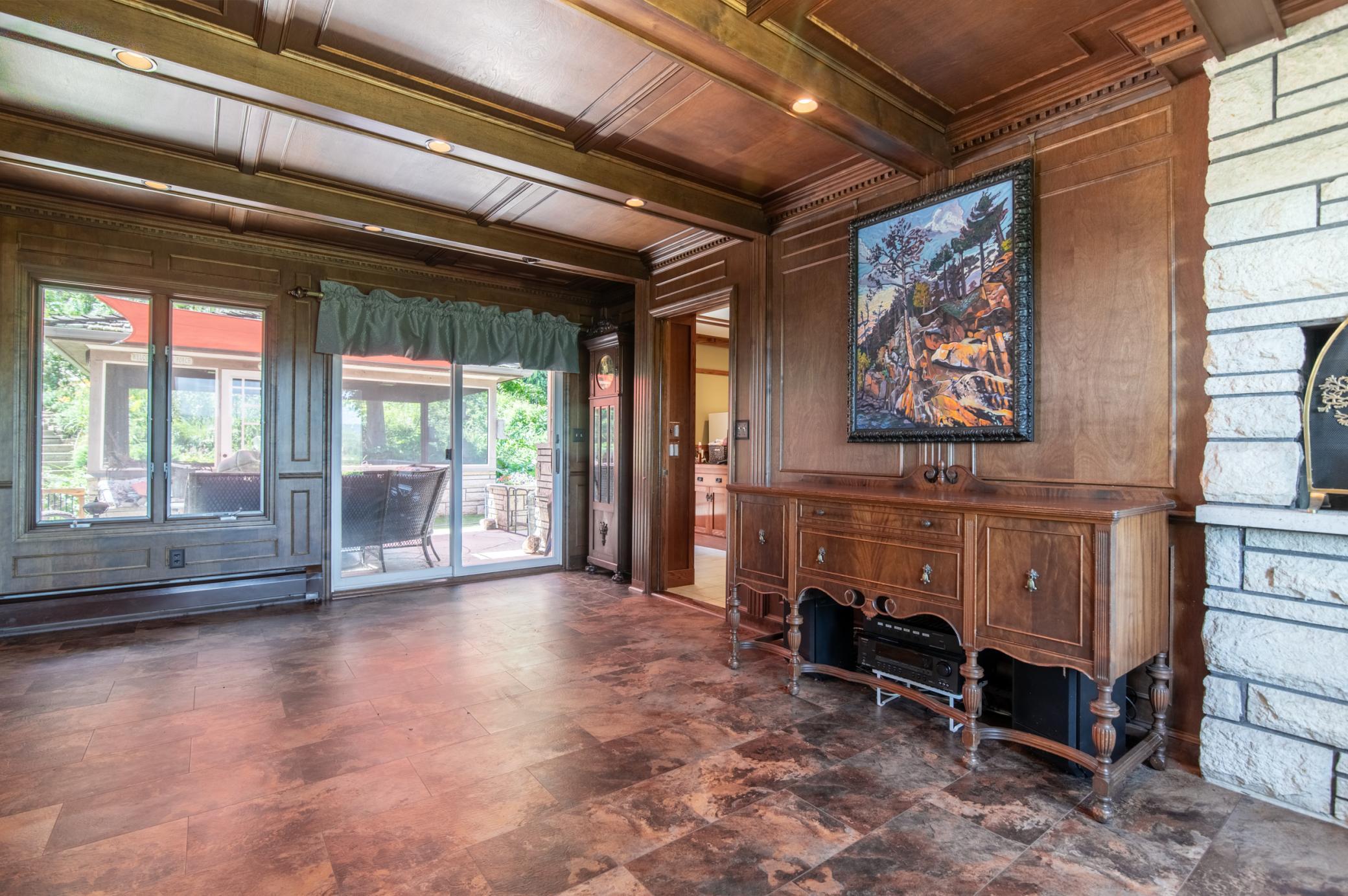 This breezeway sits between the family/game room to the right and the formal dining area just to the left and out of frame.