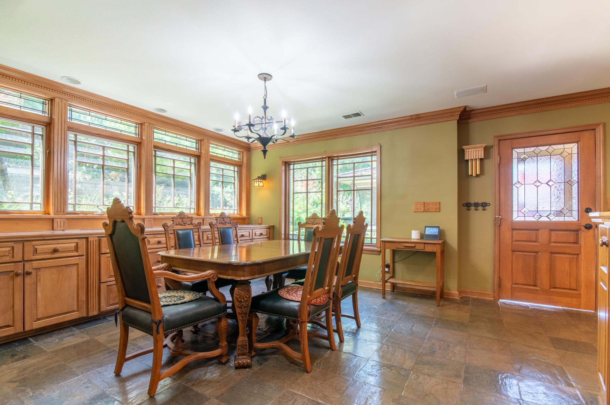 The dining area overlooks the backyard and sits just at the edge of the koi pond that every visitor to this home is curious to see.