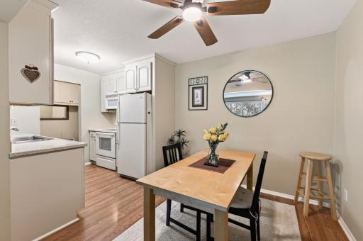Dining area conveniently located just off the kitchen! Newly added remote controlled ceiling fan!