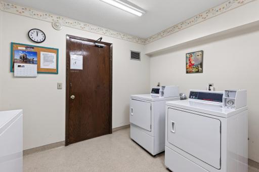Community laundry room with coin operated washers and dryers on each floor. Conveniently located right across the hall from unit #209!
