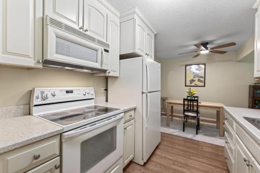 Good workspace in the kitchen, and easy to navigate! The stainless oversized sink has an updated faucet and newer disposal.