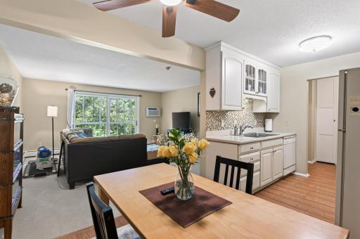 The floor plan has an open feel, and the natural light from the porch windows enhances the dining area too!