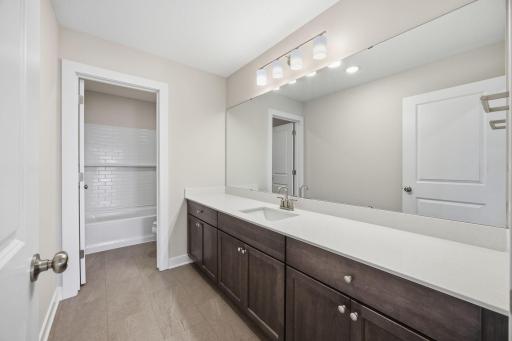 Another Upper-Level Full Bathroom Serving the Secondary Bedrooms