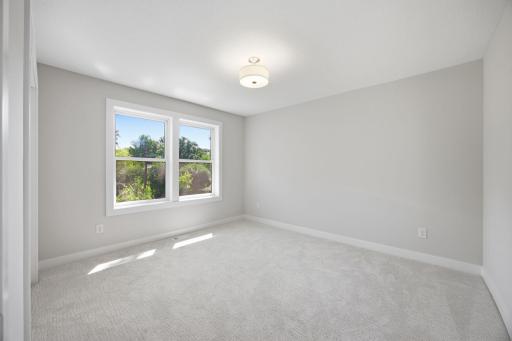 Upper-Level Bedroom #4 Featuring Generous Space and Natural Light