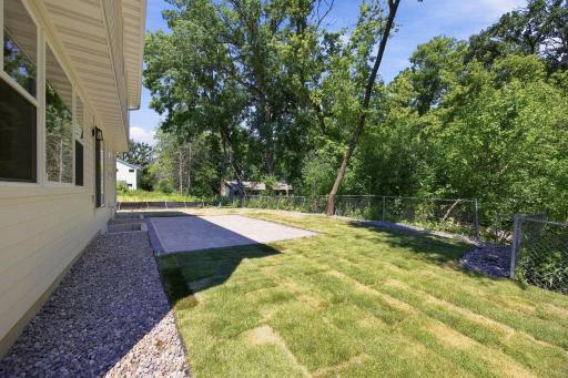 Brand-new landscaping, fresh sod, and a new stone patio, all completed in July 2026.