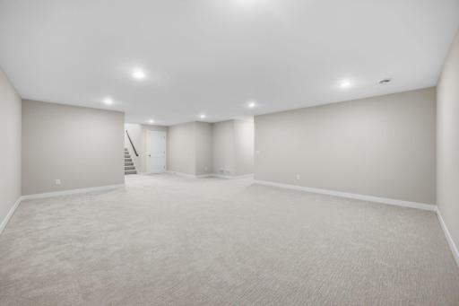 Another View of the Spacious unfurnished family room in the finished lower level, ready for your personal touch.