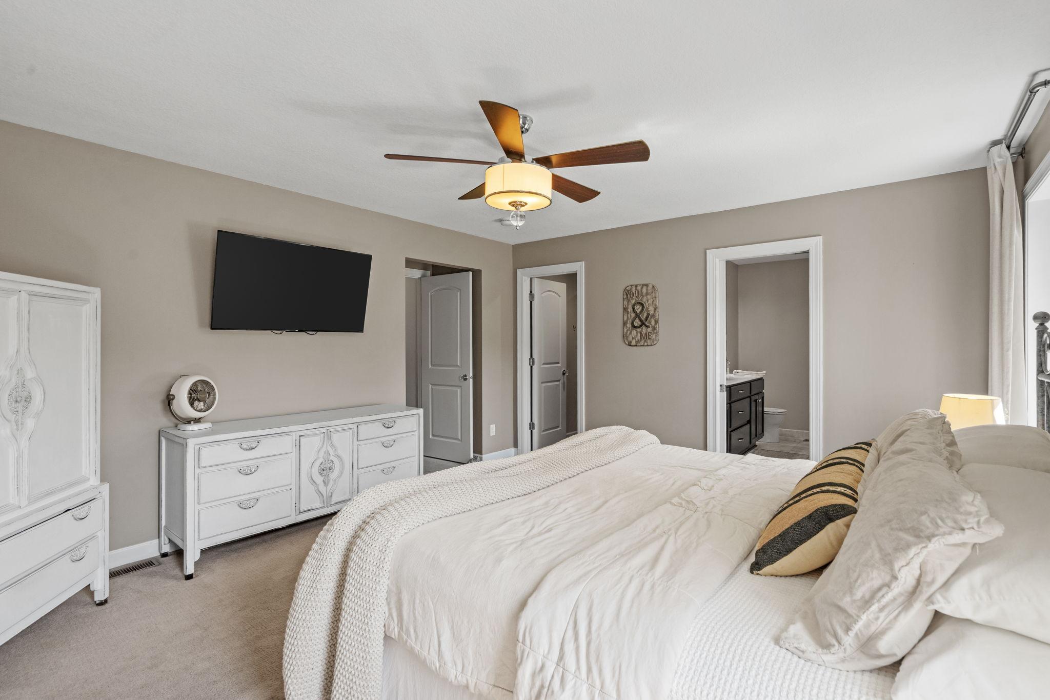 Spacious primary suite with private bath and walk-in closet