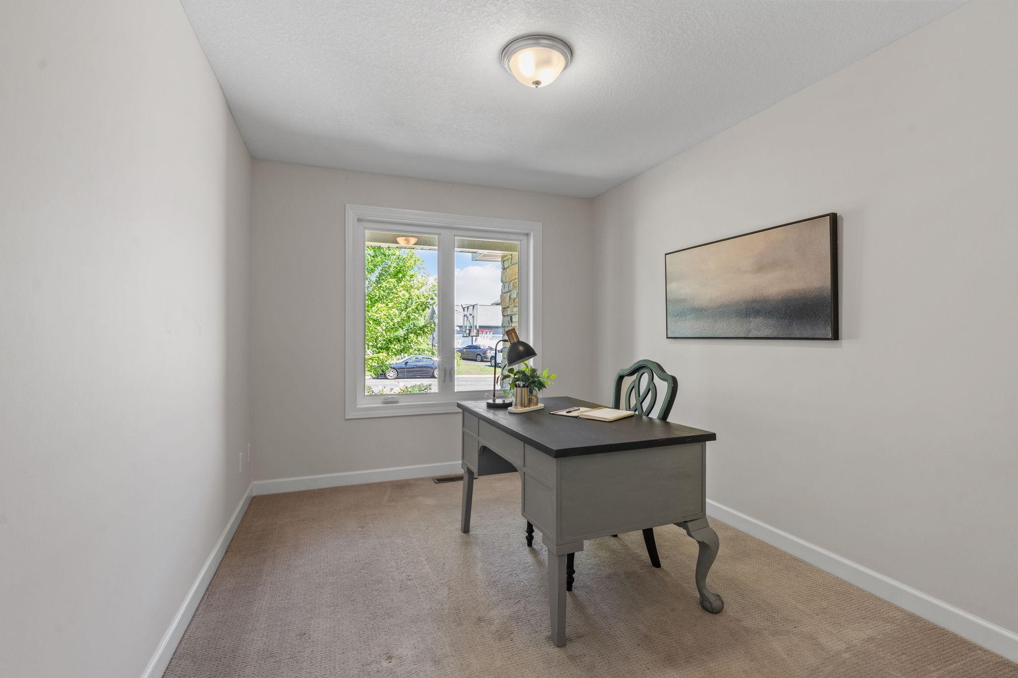 Flexible room perfect for an office, nursery, or guest bedroom.