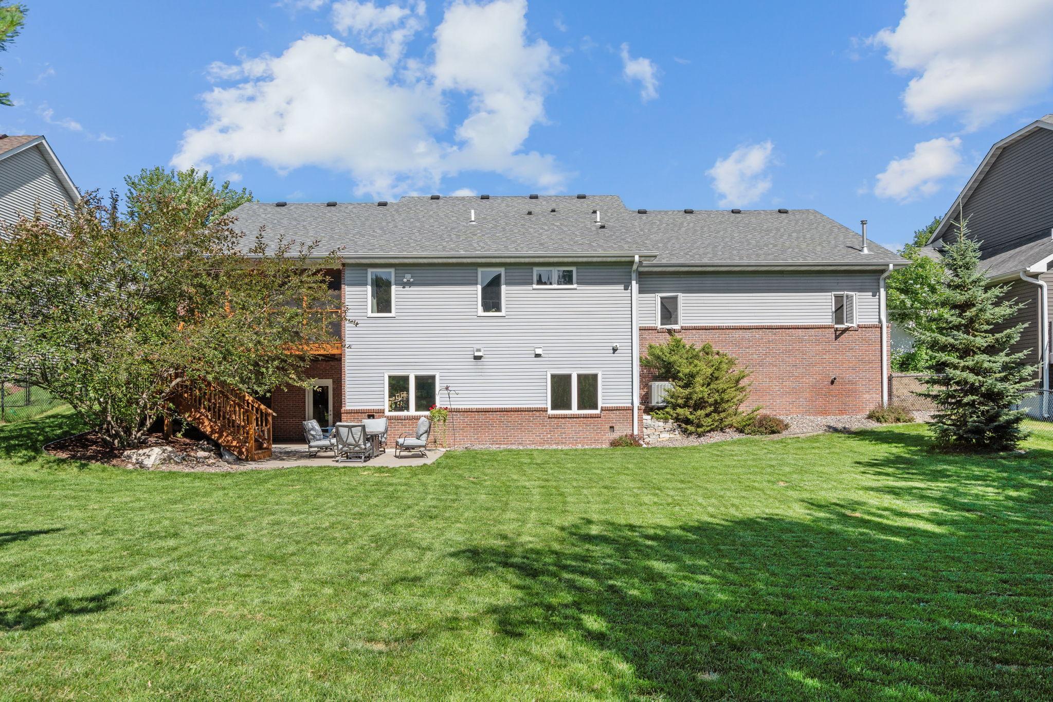 Expansive, level backyard with room to play and entertain.