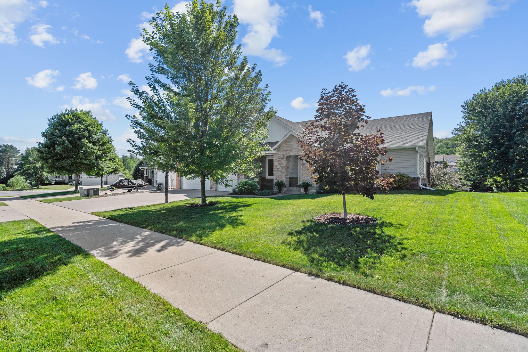 Beautifully landscaped and ready to welcome you home.