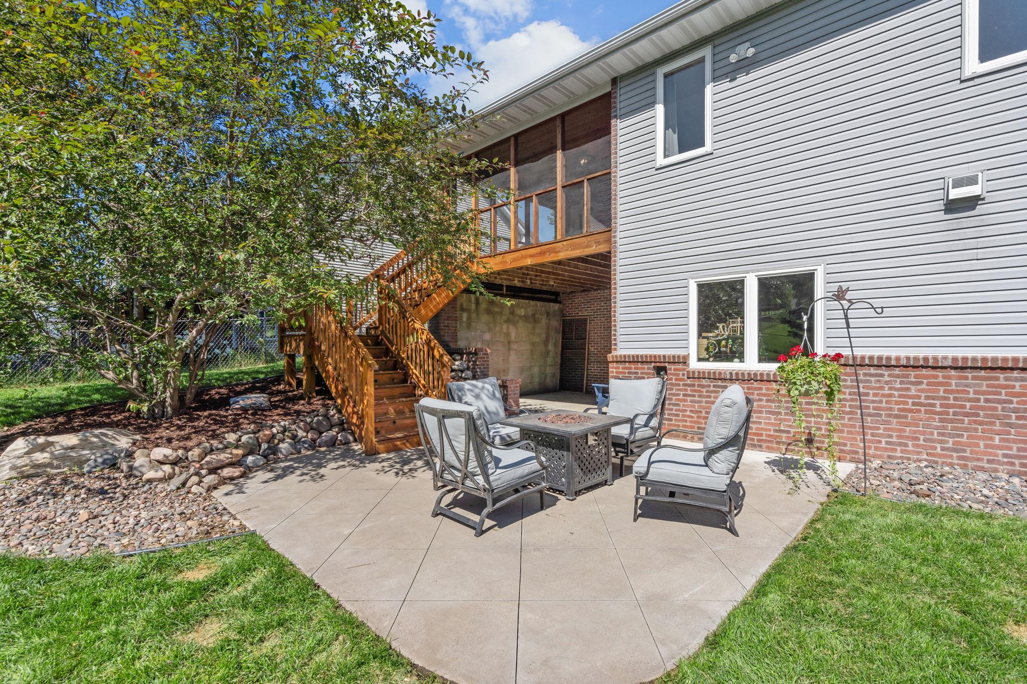 Lower patio creates the perfect spot for evenings around the fire table.
