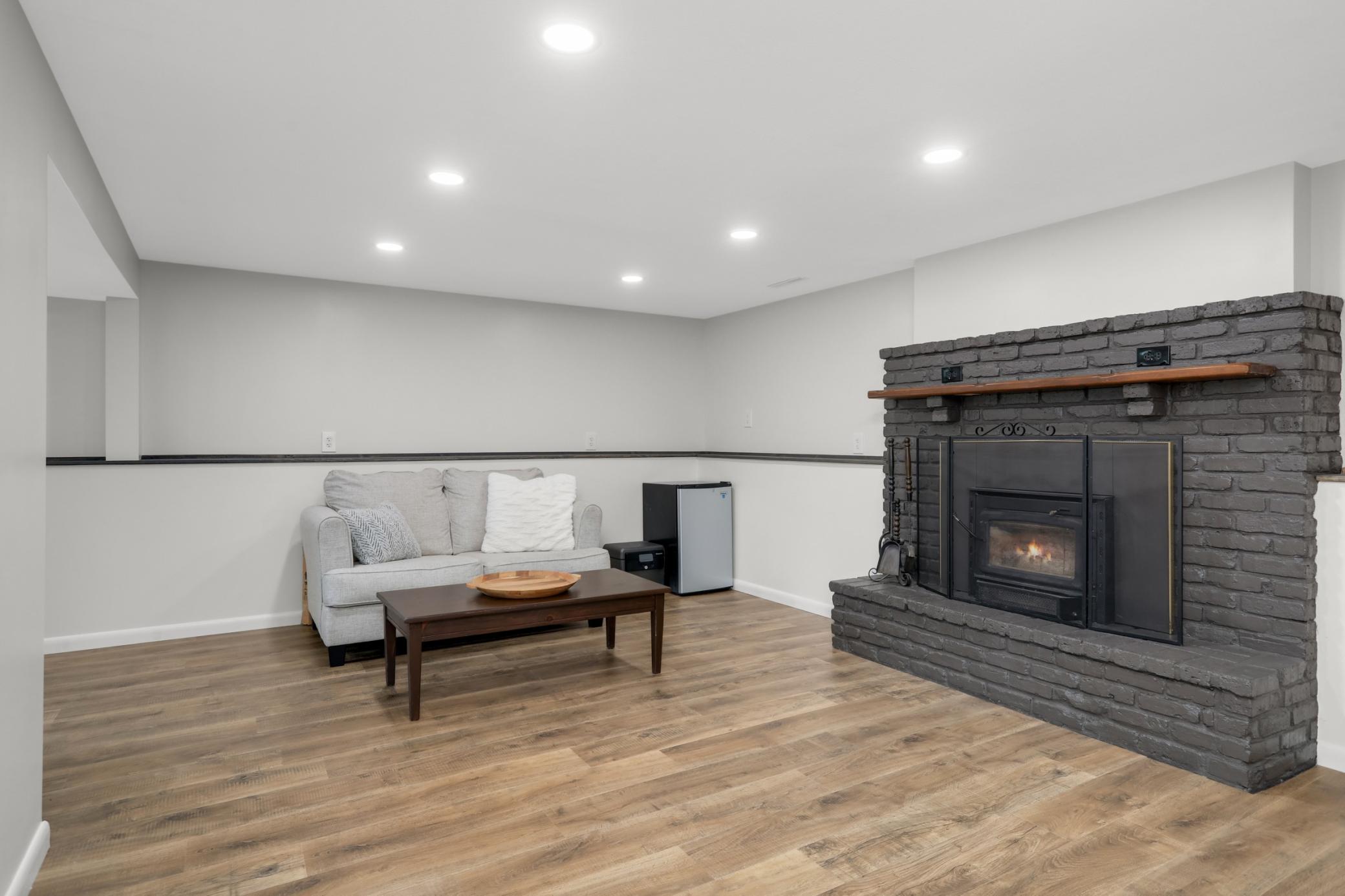 Lower level was recently refinished with new sheetrock, vinyl plank flooring and recessed lighting.