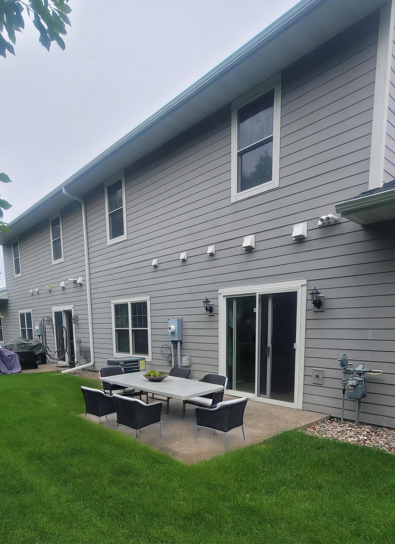 Enjoy evenings on the back patio Virtually Staged