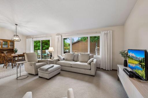Generous windows bring abundant natural light into the main living spaces.
