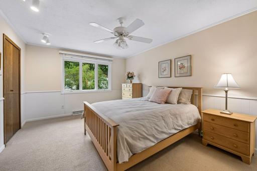 The spacious primary bedroom has an ensuite bath.