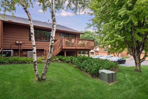 Mature surroundings provide a peaceful backdrop for your end unit townhome.