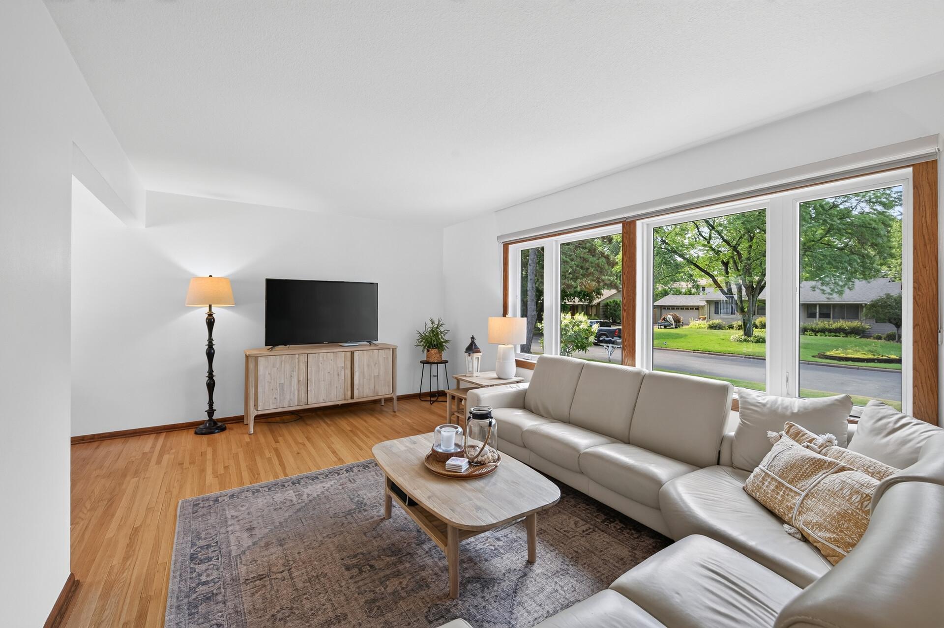 New living room windows letting in beautiful natural lighting.