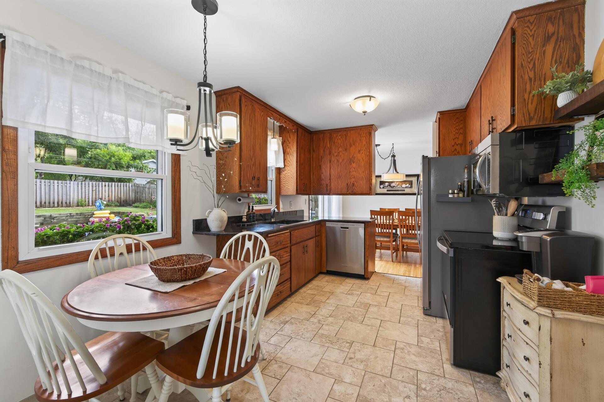 Kitchen with tons of storage and breakfast nook.