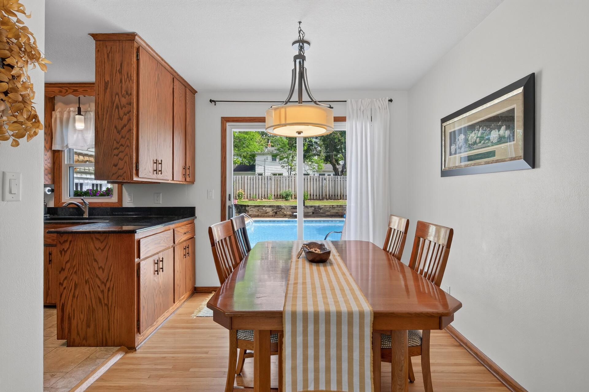 Dining room with sliding doors leading out to the backyard.