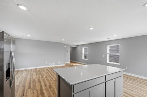 Another view of the spacious main floor. Model photos. Options and colors will vary.