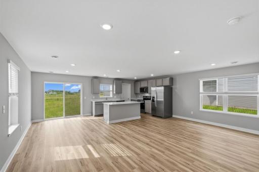 Open concept main floor perfect for entertaining and life! Model photos. Options and colors will vary.