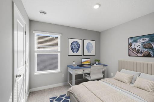 2nd spacious, upper-level bedroom. Model photos. Options and colors will vary.