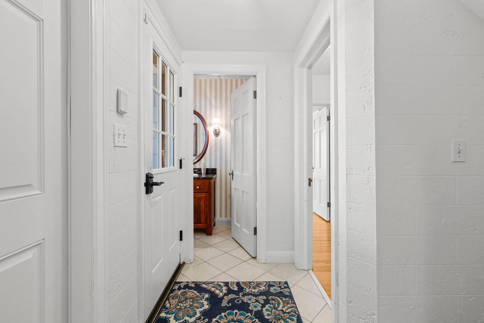 Back hall provides circular flow to main level
