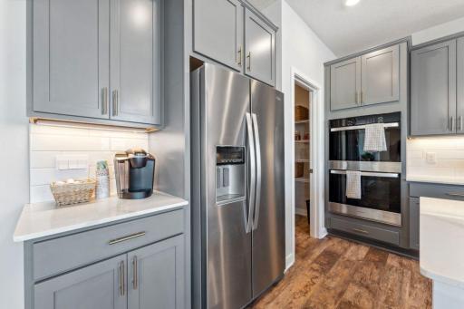 Coffee bar, anyone? Photo of model home, colors and finishes are similar.