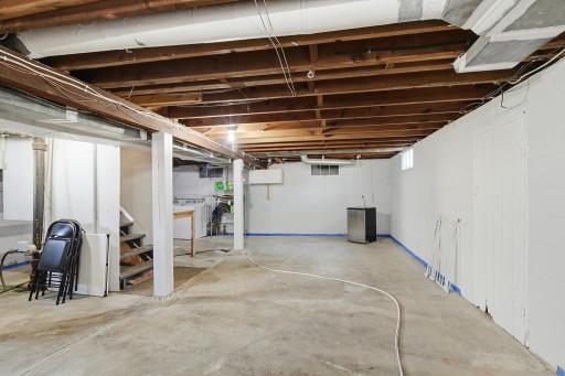 Nice open basement offers lots of storage and hobby space, or rec area.