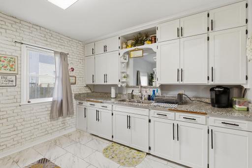 Super convenient opening to the living room above the sink.