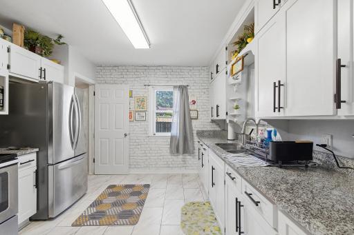 Gorgeous, updated kitchen with granite counter tops and newer stainless steel appliances.