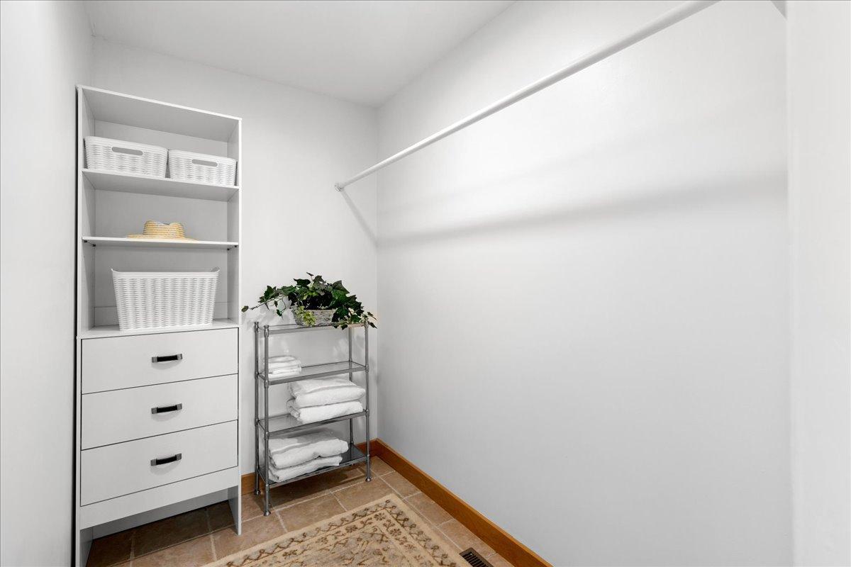 Spacious walk in closet.