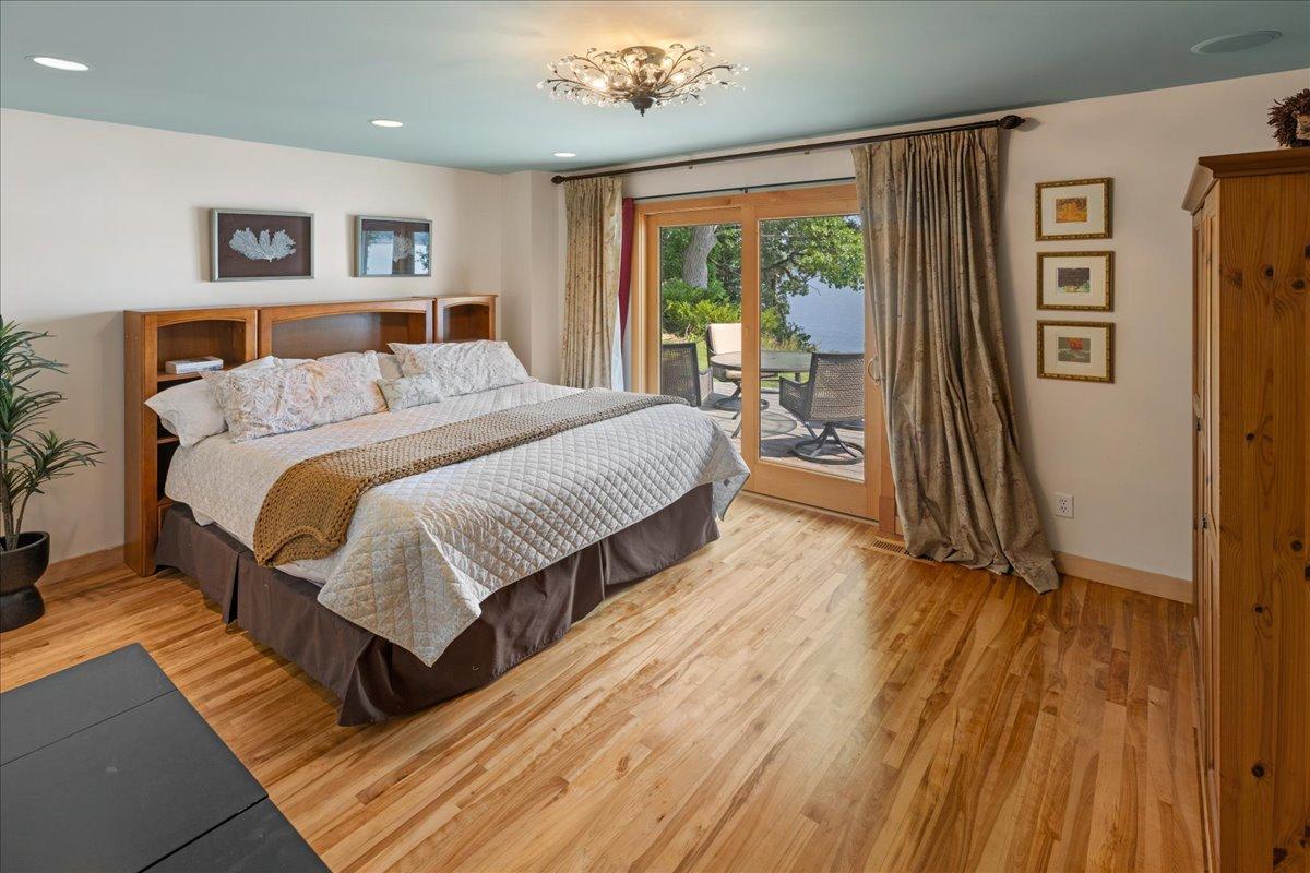 Primary Bedroom with Lake views PM & AM.