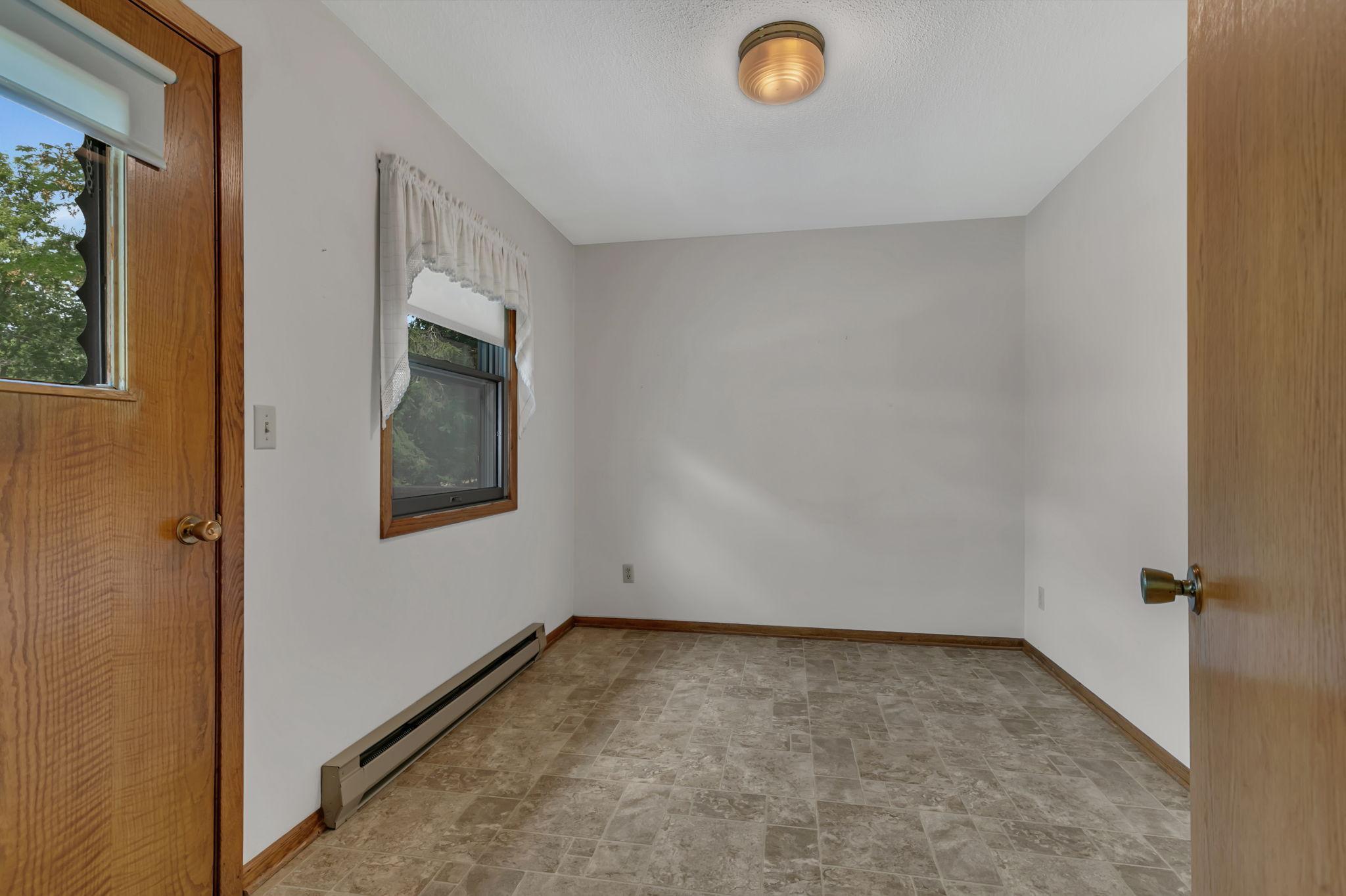 The flex room with deck access just off of the dining room