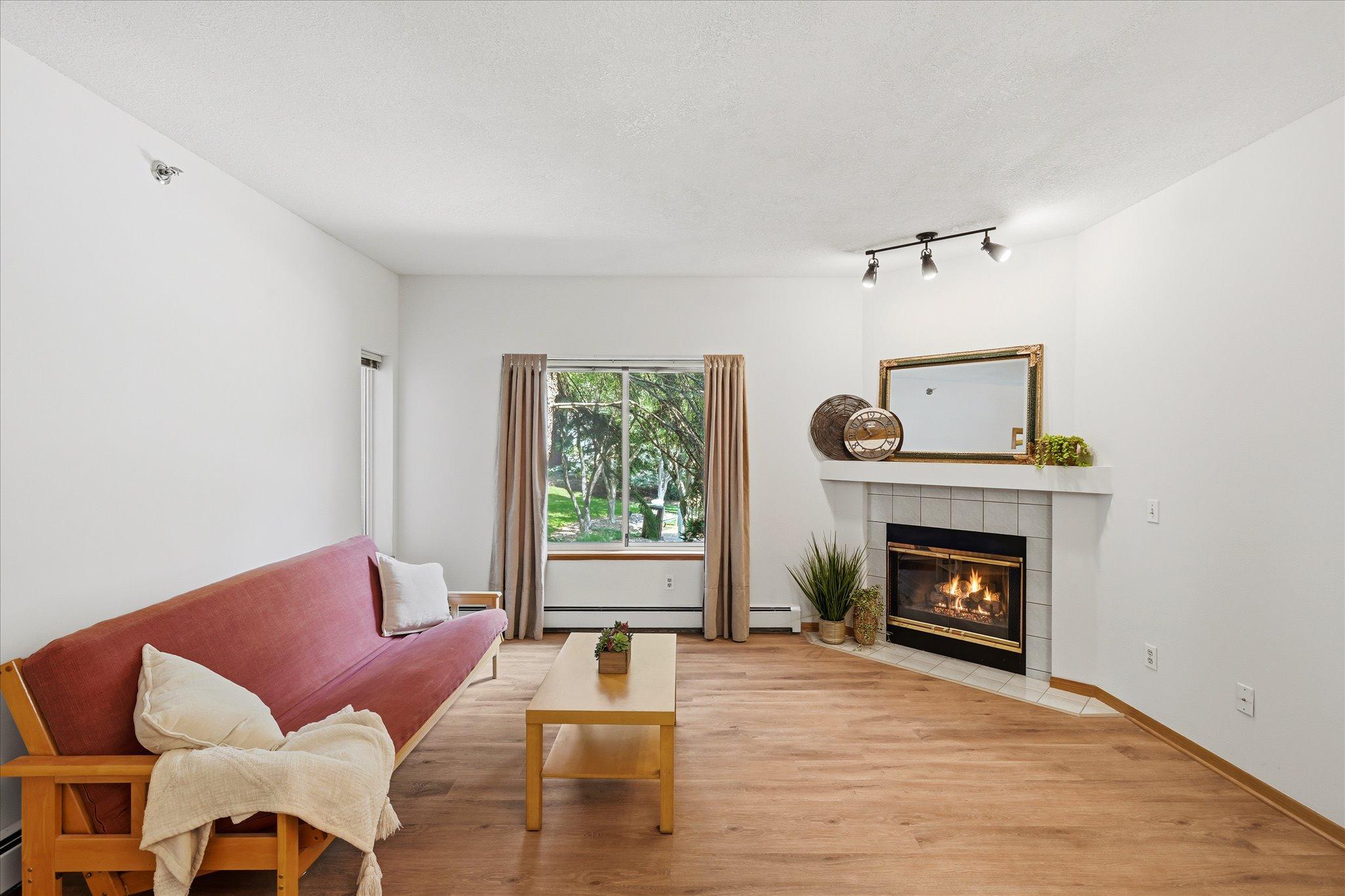 Notice: new floors, paint, updated fireplace, new cabinet, new ac, appliances.......