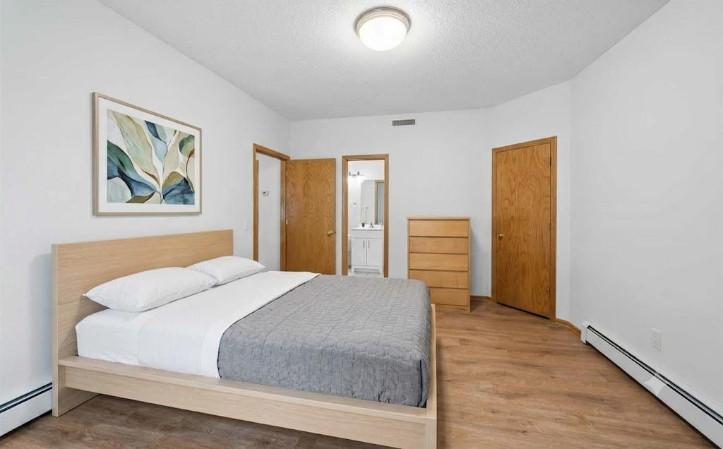 Digital staging. Walk through full bath and huge walk in closet, new floors and step out to private patio.