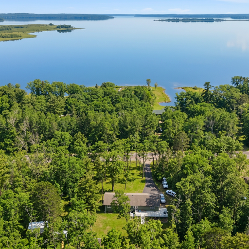 2.5 acres and lake access with your own dock right across the street.