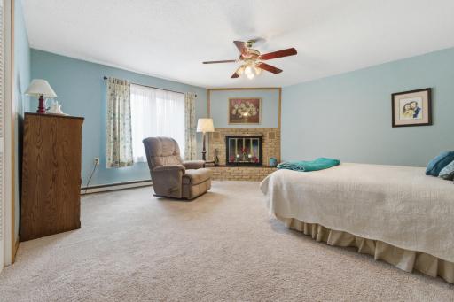 Main floor primary bedroom, fireplace for show not functional