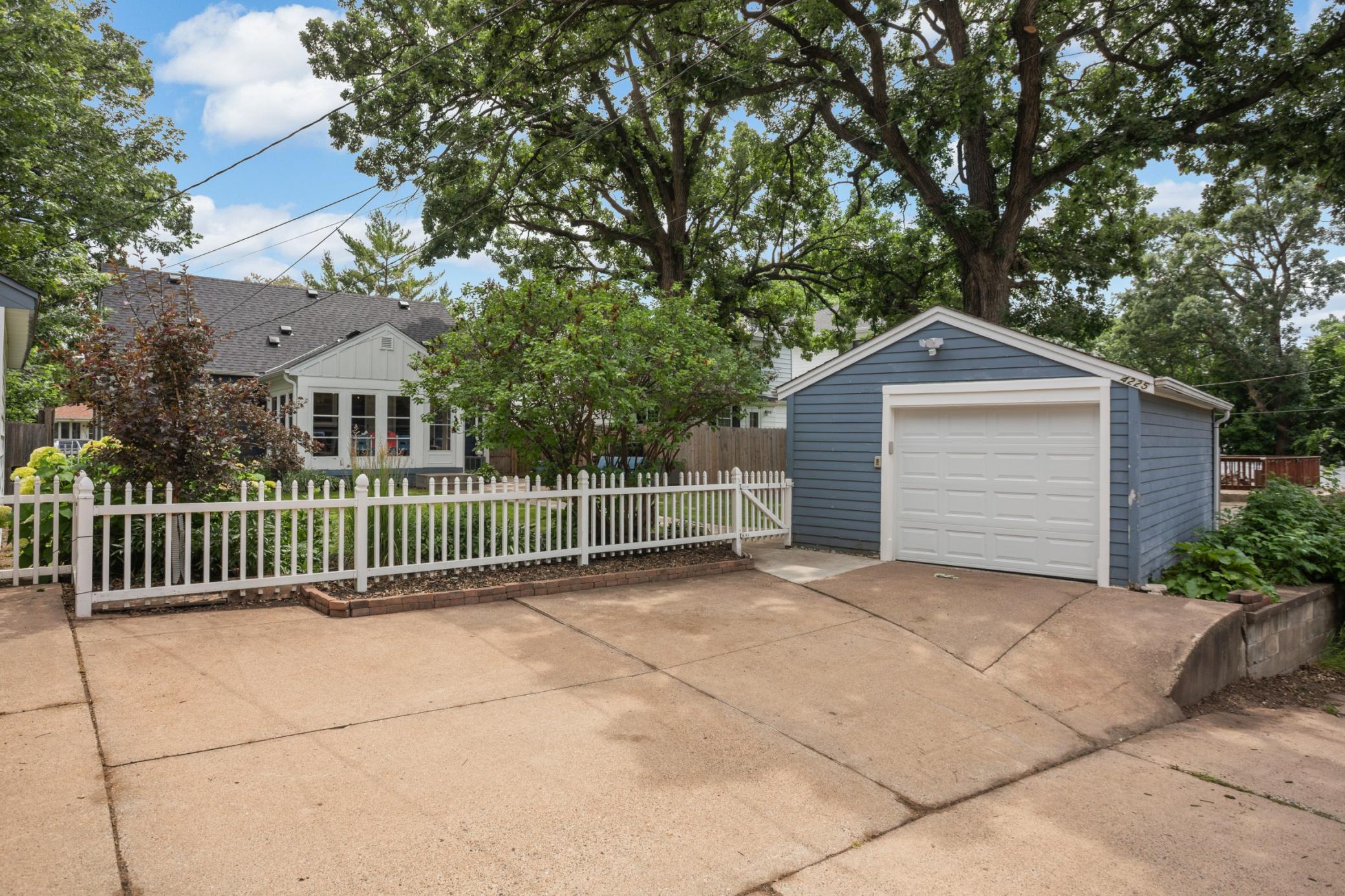 Large driveway for off street parking, plus 1.5 stall garage with excess storage and new garage door