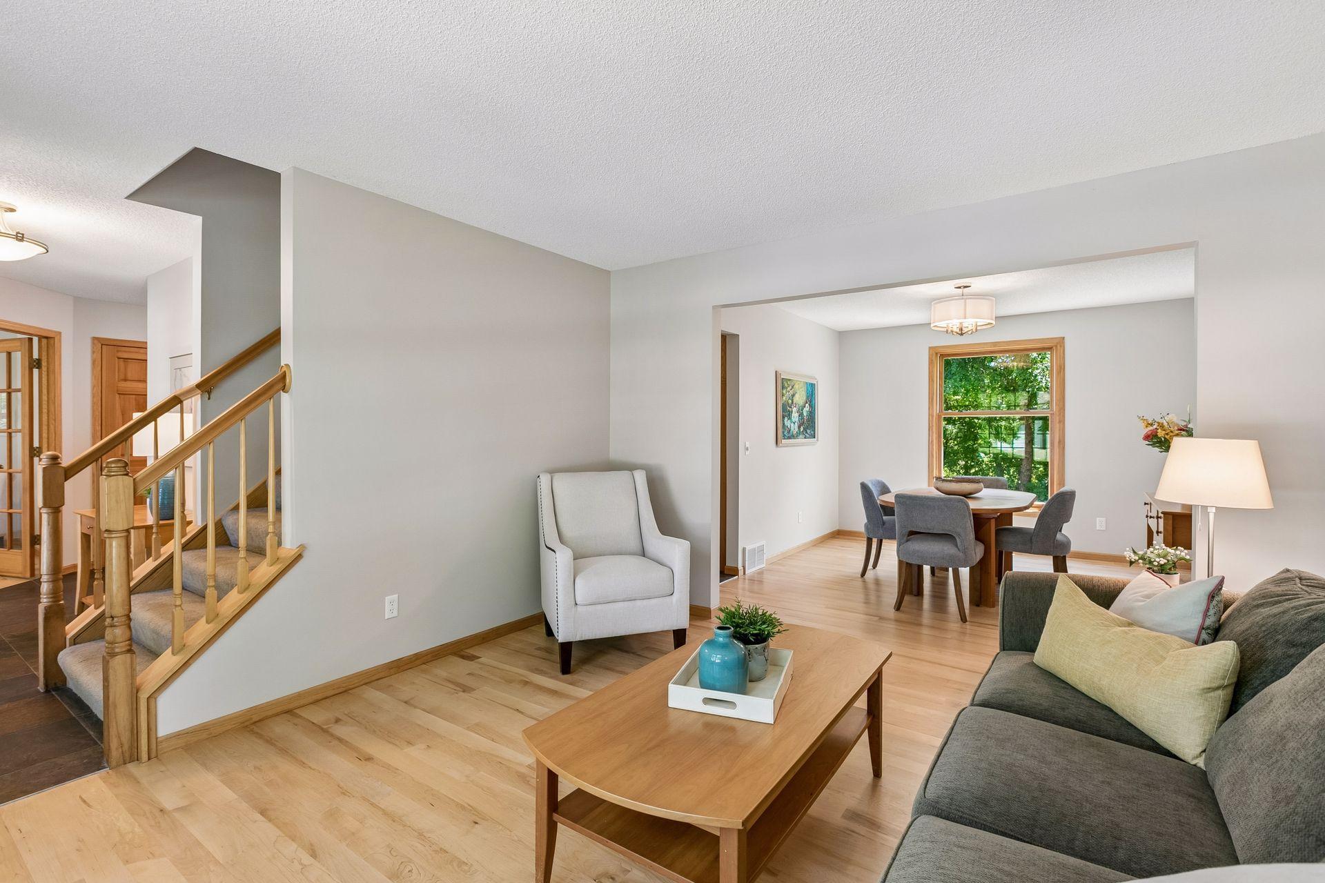 Living room just to the right of the front entry and staircase. Plenty of natural light to brighten the room!