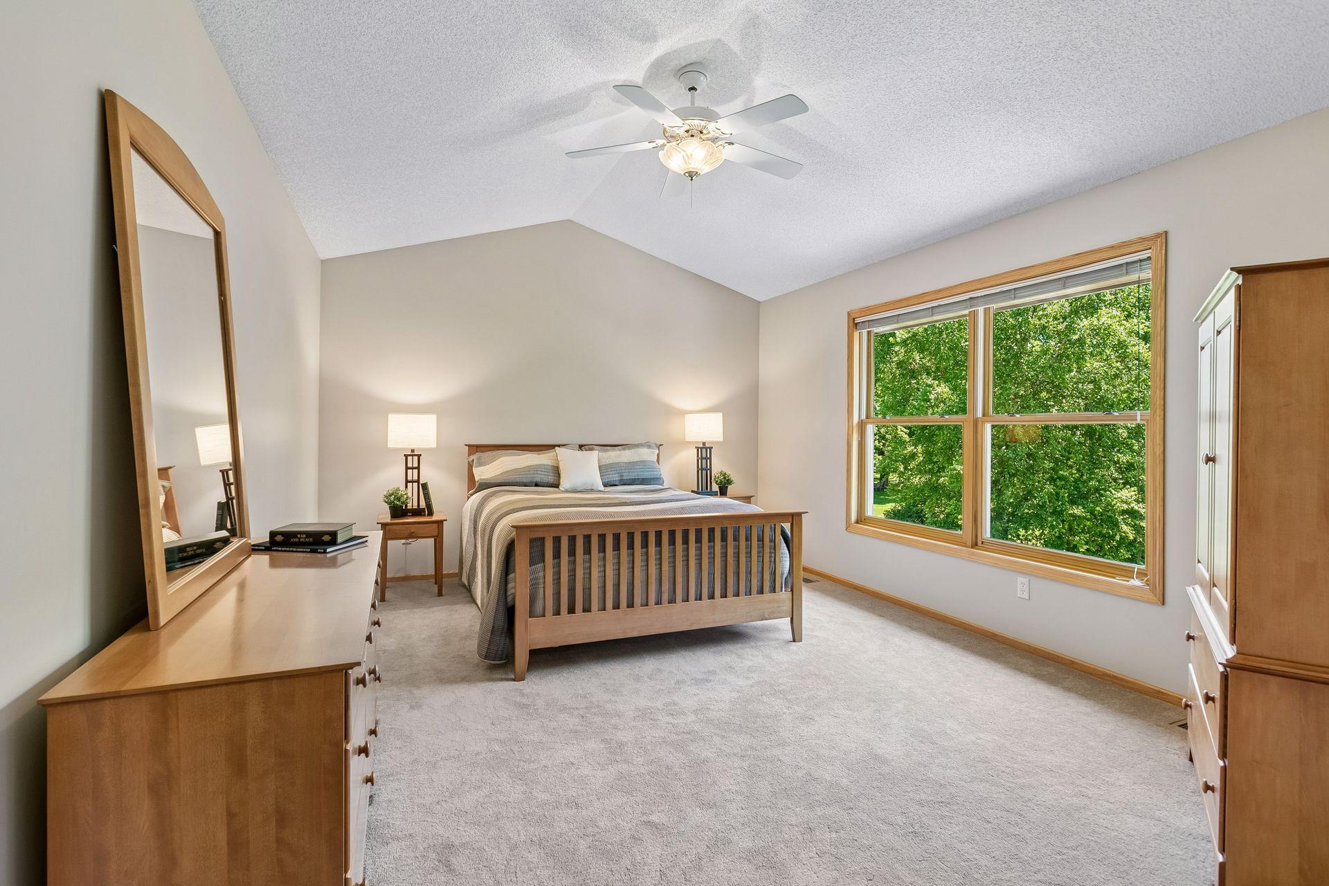 Moving upstairs to the master bedroom at the end of the hallway.