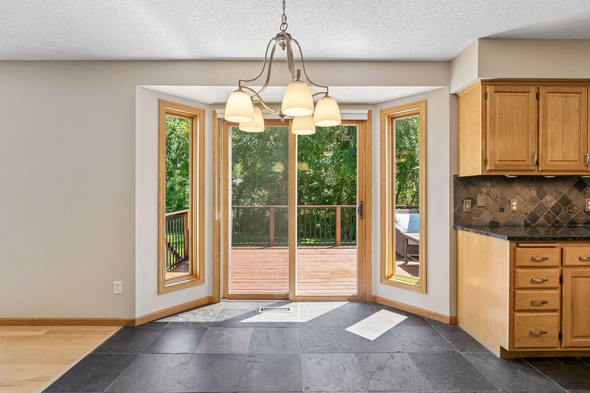 View from informal dining area with bump out straight onto the deck.