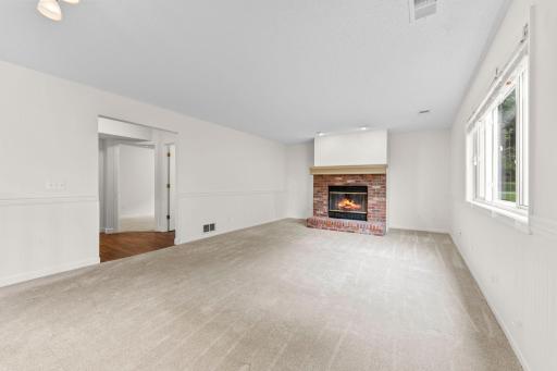 Family Room looking toward Bedroom 4 - Main Level (digitally enhanced flame)