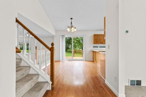 Dining Room view from Foyer - Stairway to Upper Level