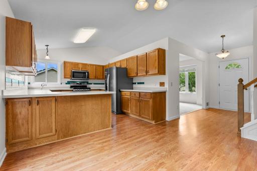 View of Kitchen, Living Room, and Foyer from Dining Room