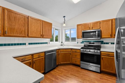 Kitchen - Corner sink, large windows, Stainless Steel Appliances