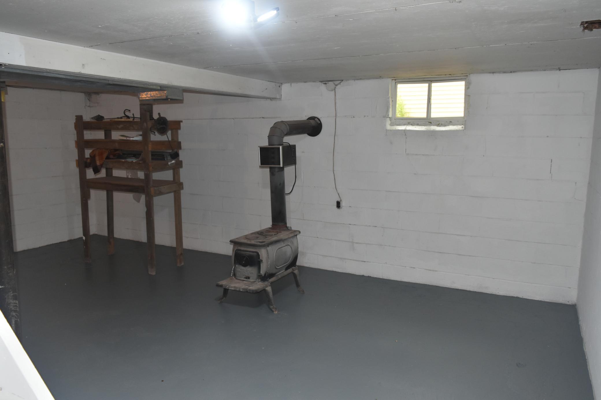 Supplemental wood heat in basement.