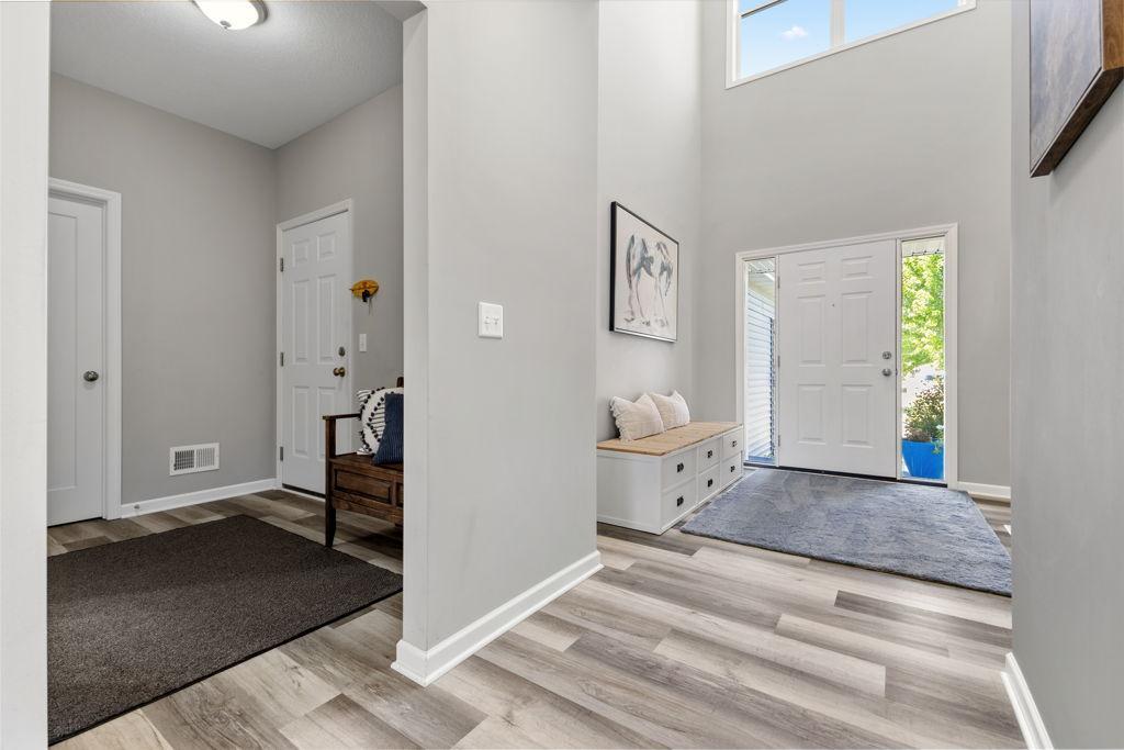 This space is so inviting. Not only a large entryway for guests but also an off to the side mudroom with a walk in closet off of the garage. There is also a 1/2 bath off of the mudroom.
